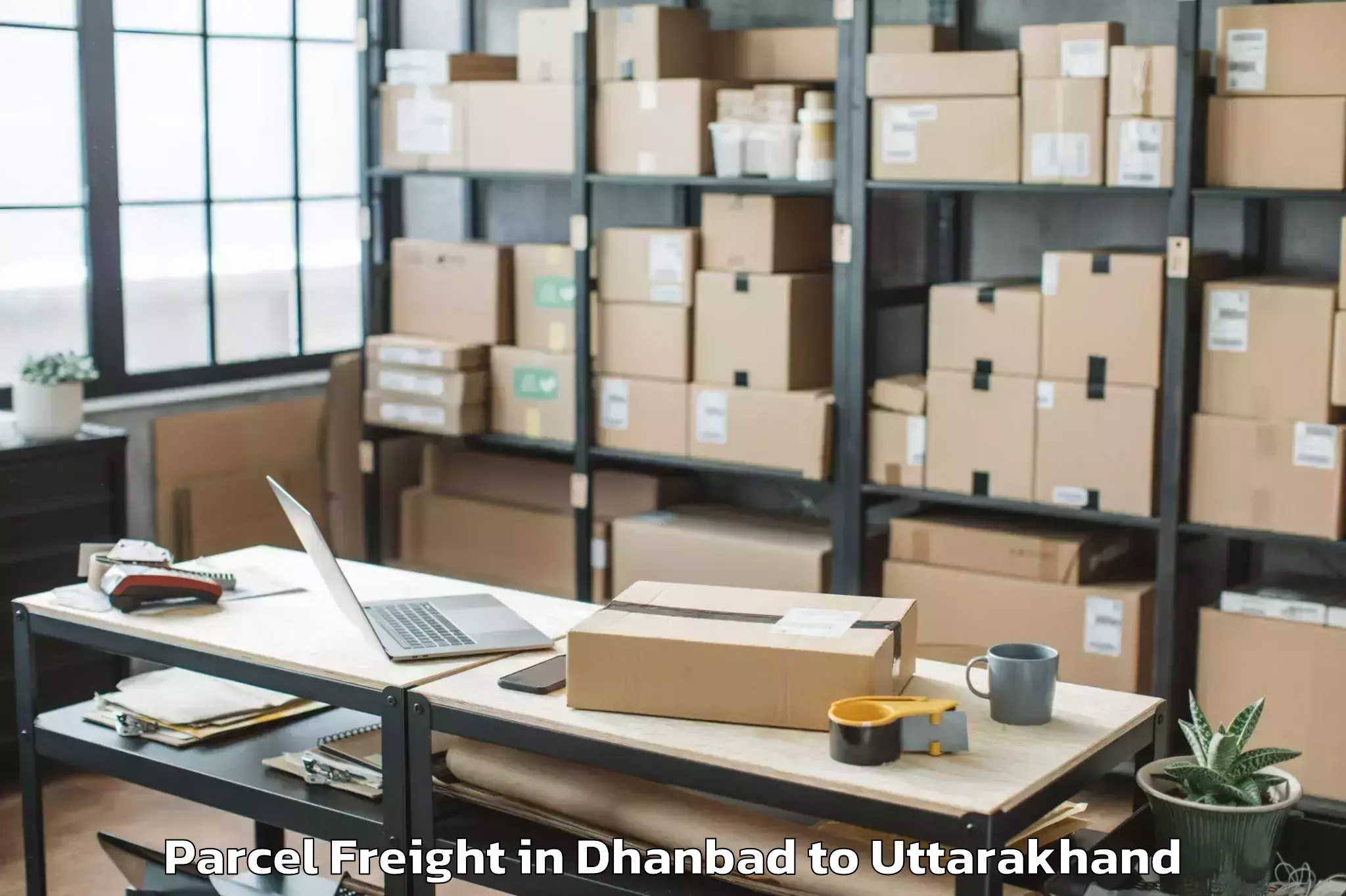 Trusted Dhanbad to Rudrapur Parcel Freight